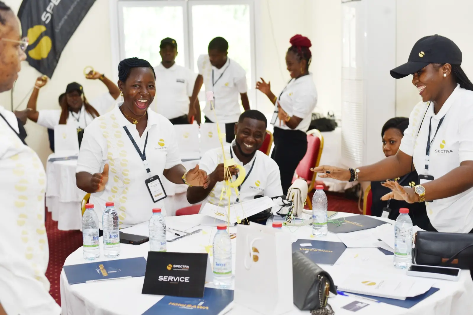 Spectra Beauté staff collaborating in a participant-led retreat activity